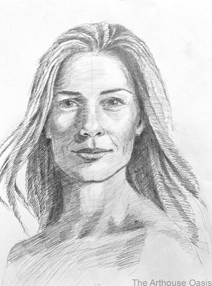 Completed pencil portrait of a woman with long flowing hair and strong tonal contrast