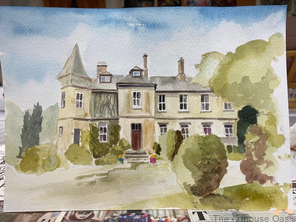 Watercolour painting of a grand Victorian-style house surrounded by trees, created at The Arthouse Oasis in Bishop’s Stortford.