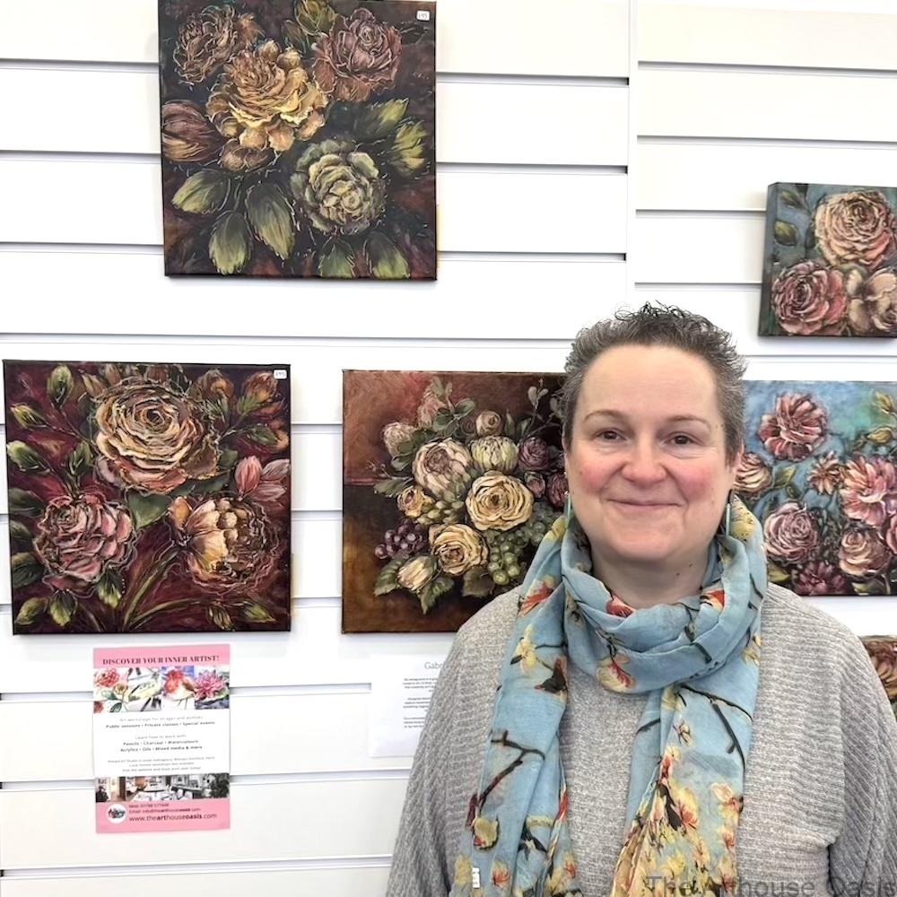 Rustic Bloom oil paintings displayed inside Bishop’s Stortford Tourist Information Centre with floral artworks arranged on exhibition for one month.