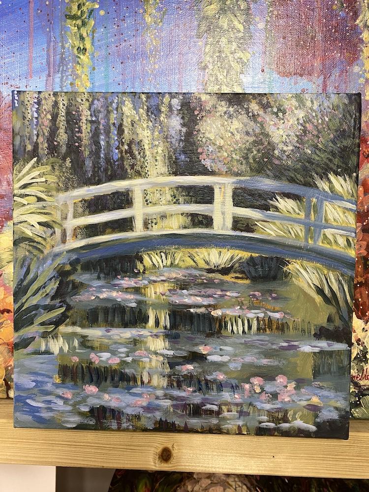 Finished acrylic painting of a white bridge over a lily pond in Monet-inspired impressionist style.