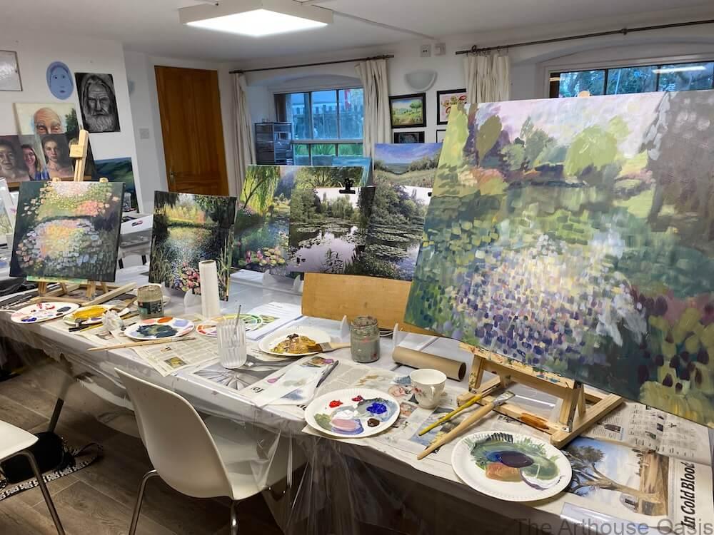 Finished large acrylic water garden painting with reflections, lily pads and impressionist textures.
